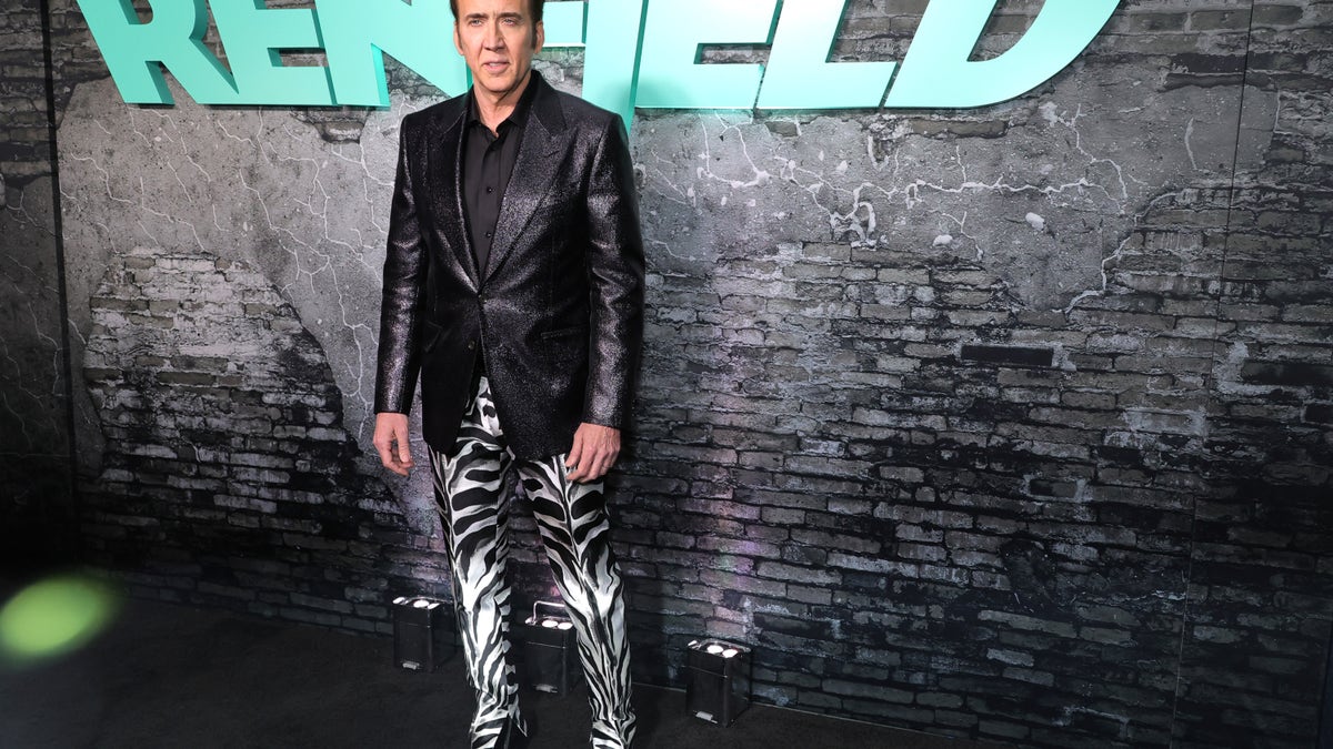 Nicolas Cage at the Renfield premiere in animal print pants.