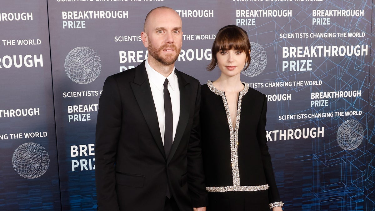 Lily Collins and husband Charlie McDowell at an event