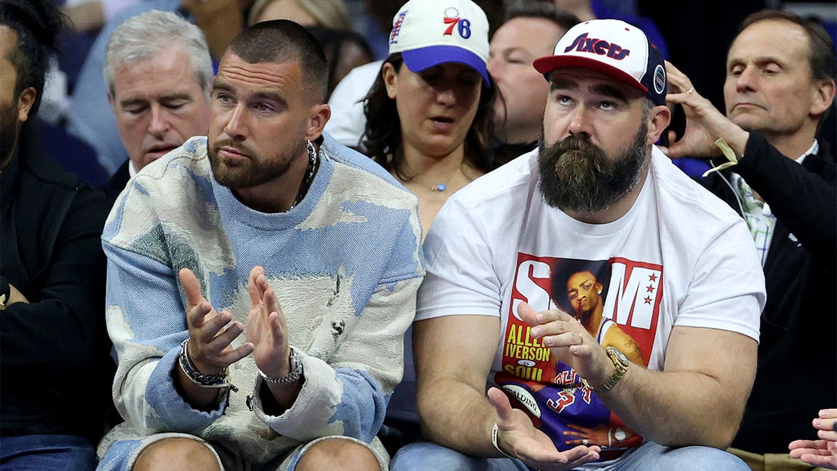 Travis Kelce and Jason Kelce at a Sixers game