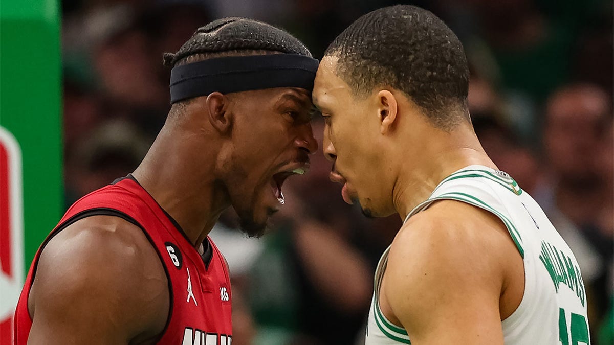 Jimmy Butler and Grant Williams exchange words