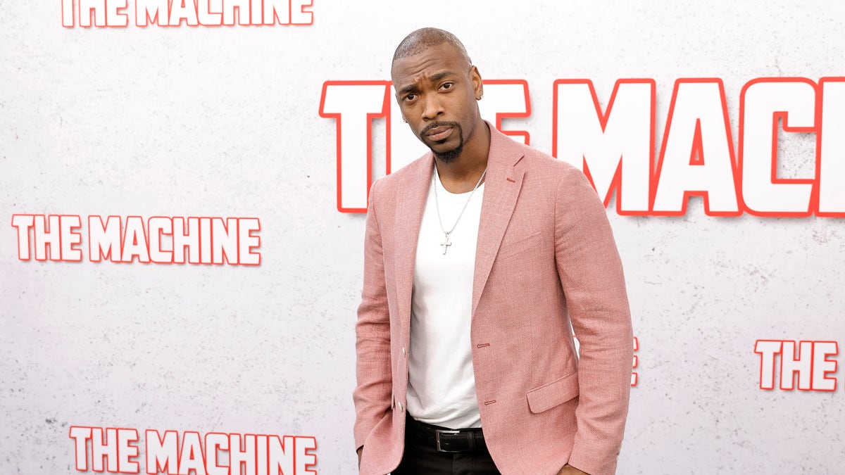 Jay Pharoah wears a blazer on the red carpet at The Machine premiere.