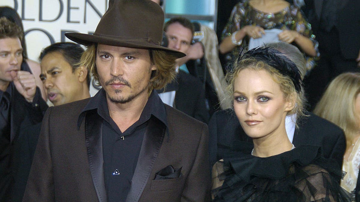 johnny depp with ex vanessa paradis at the 61st golden globes