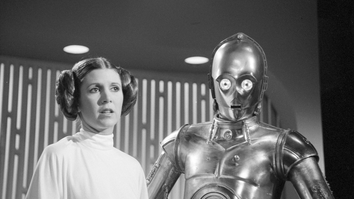 THE STAR WARS HOLIDAY SPECIAL. Carrie Fisher (as Princes Leia) and Anthony Daniels (as C3PO)