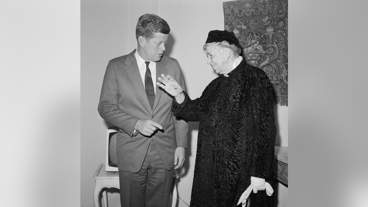John F. Kennedy talks with Eleanor Roosevelt