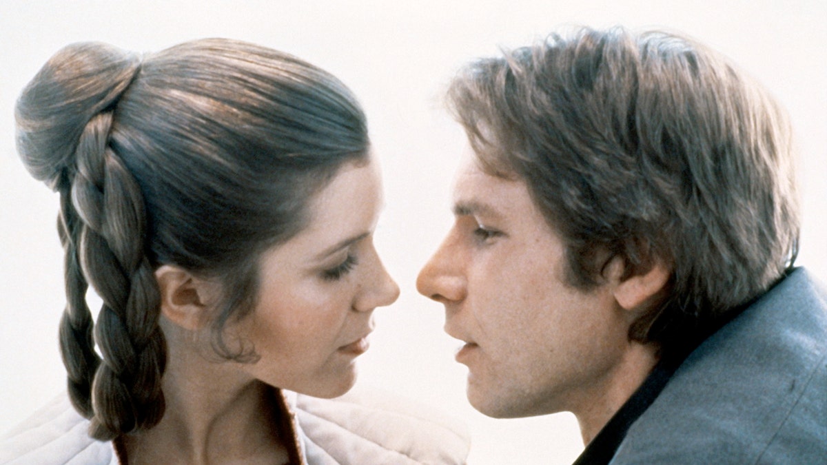 Carrie Fisher, Harrison Ford on set