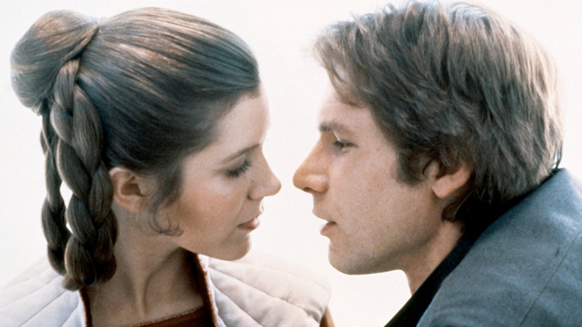 Carrie Fisher, Harrison Ford on set