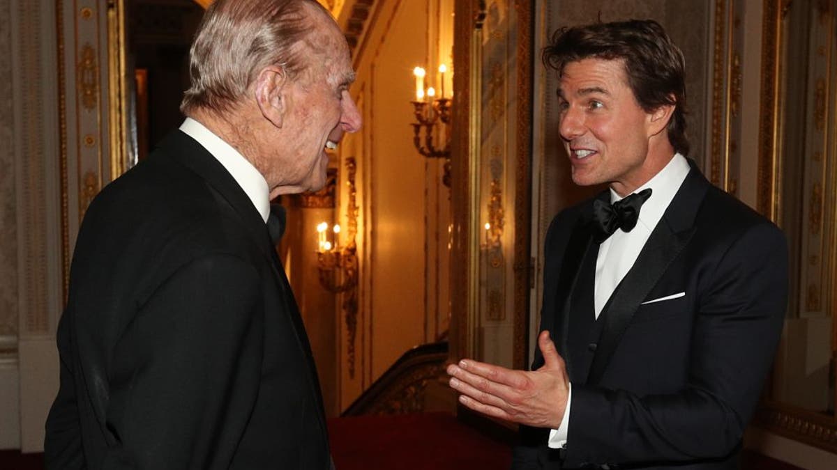 tom cruise beaming at prince philip