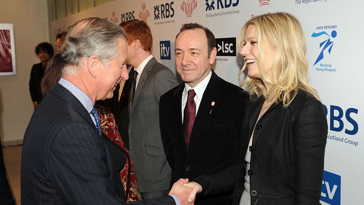prince charles shaking hands with gwyneth paltrow