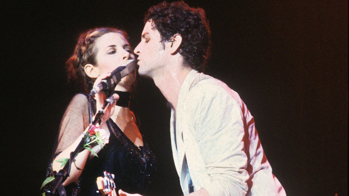 Stevie Nicks and Lindsey Buckingham on stage