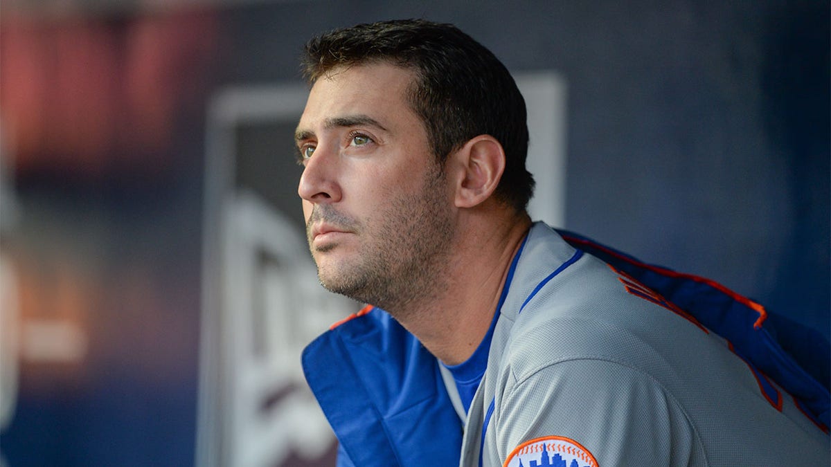 Matt Harvey sits in the Mets dugout