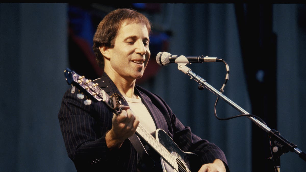 Paul Simon performing in 1980