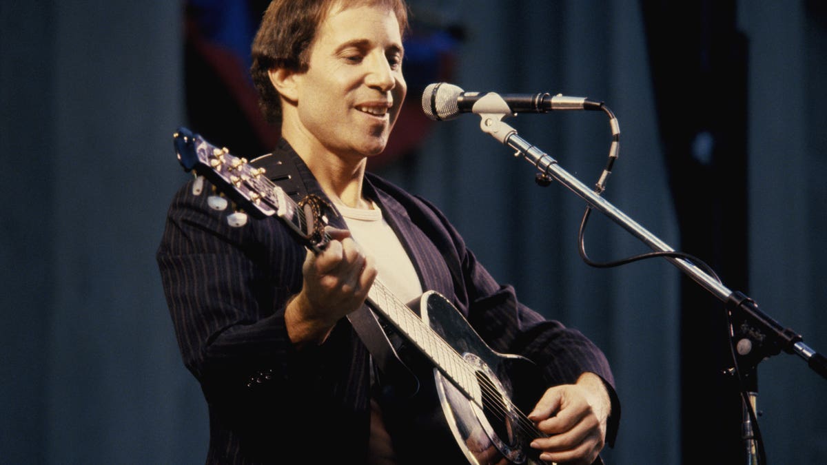 Paul Simon performing in 1980