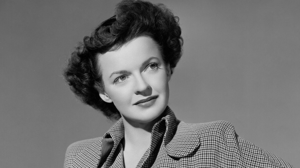 A close-up of Dale Evans with dark hair