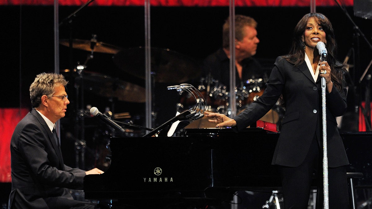 David Foster playing piano while Donna Summer sings