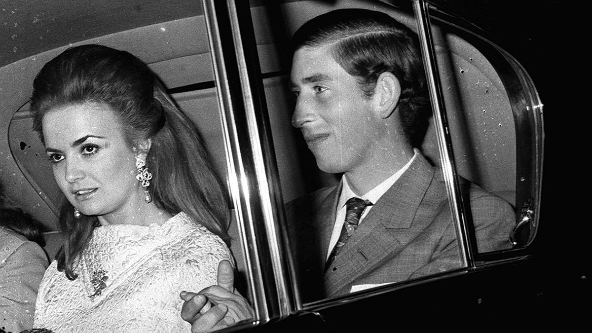 Prince Charles in a car with Lucia Santa Cruz