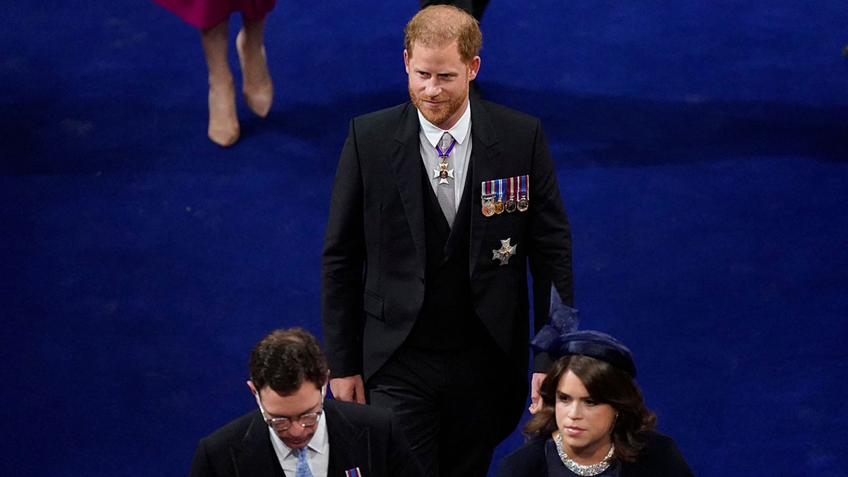 Prince Harry walking in Westminster Abbey