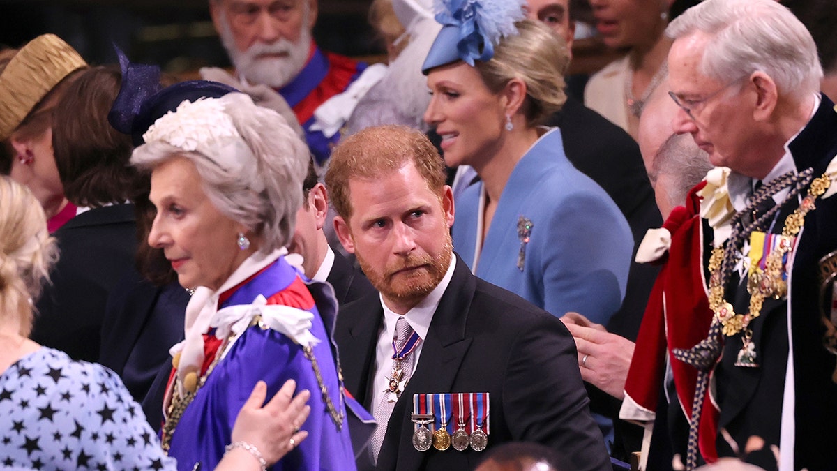 Prince Harry in his morning suit making a funny face