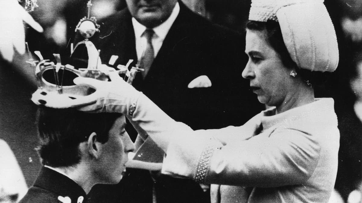 Prince Charles being crowned with coronet by his mother Queen Elizabeth