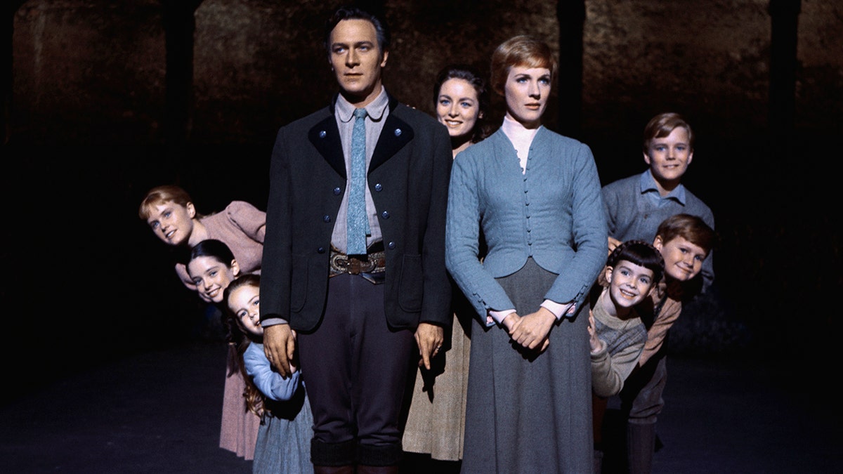 Julie Andrews and Christopher Plummer are flanked on all sides by their children