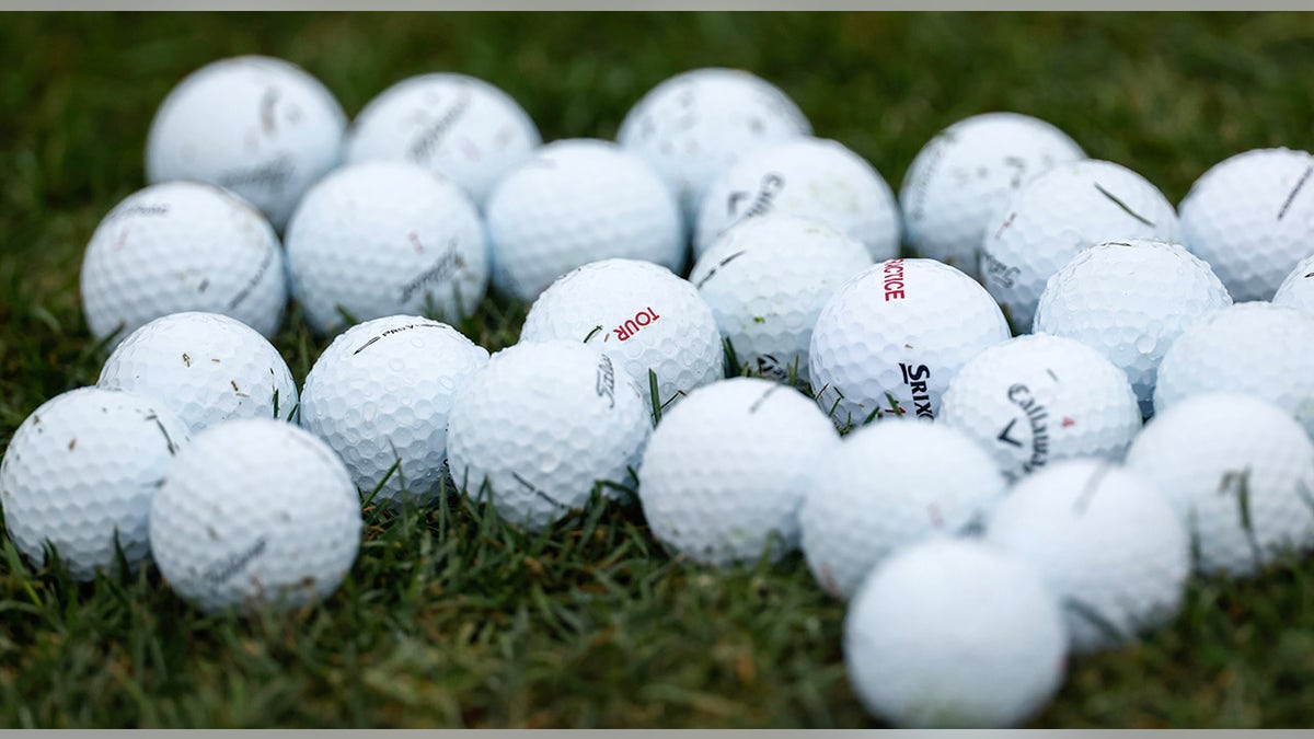 Golf balls on grass