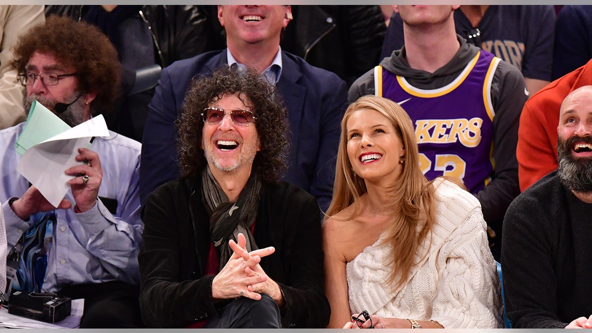 Howard Stern smiles at Jumbotron