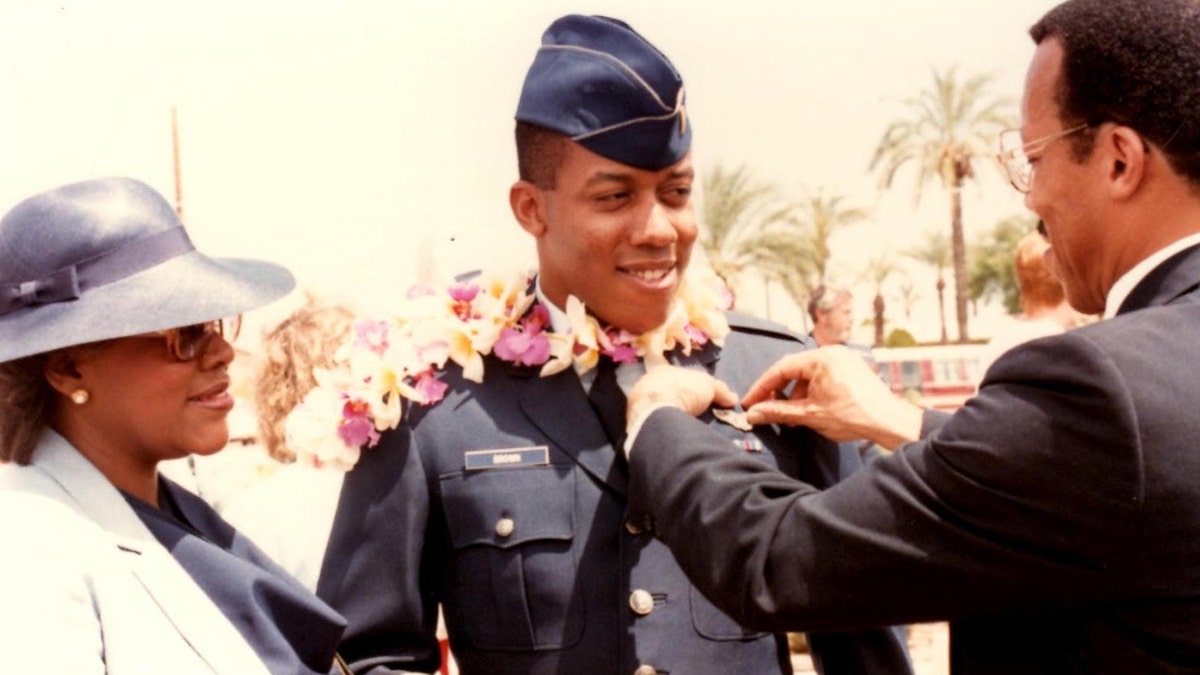 Brown, his parents