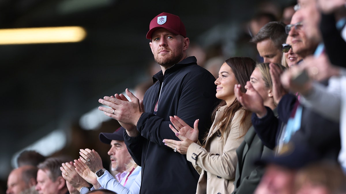 J.J. Watt looks on from the stands