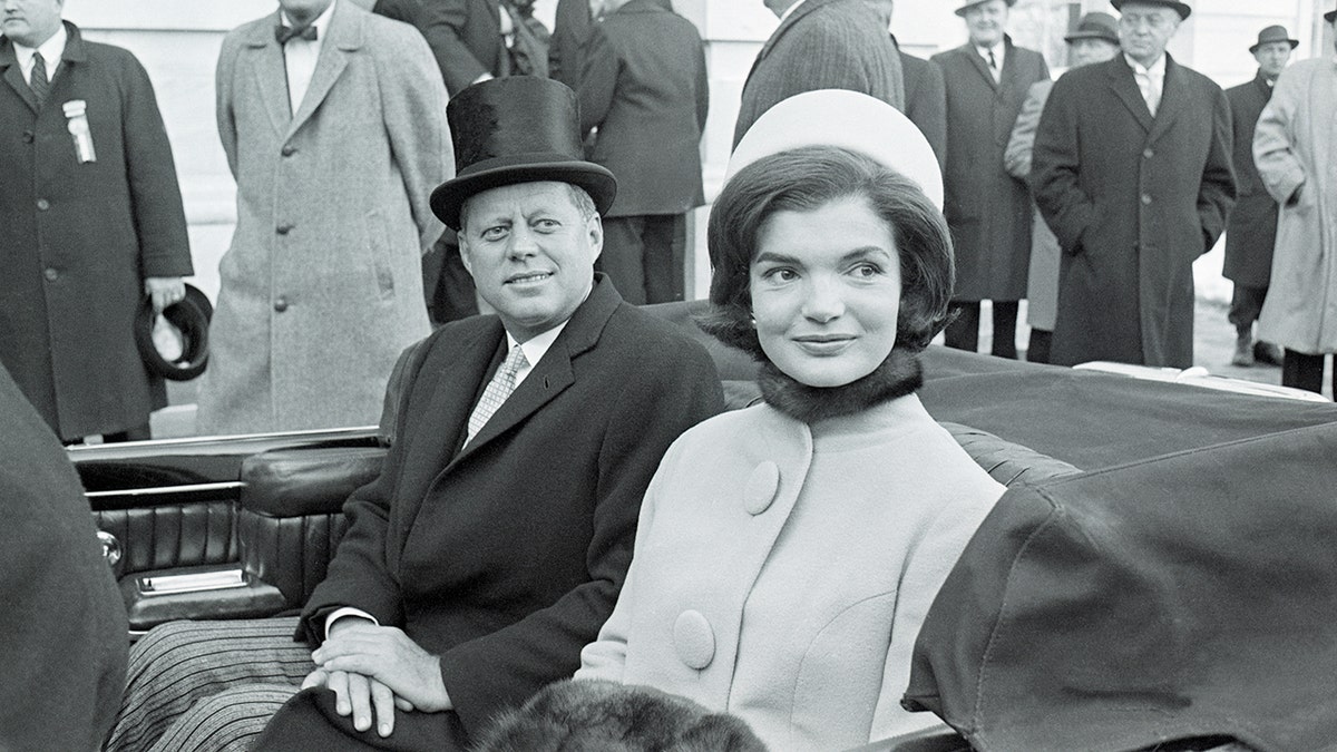 Jackie Kennedy and JFK in an open car