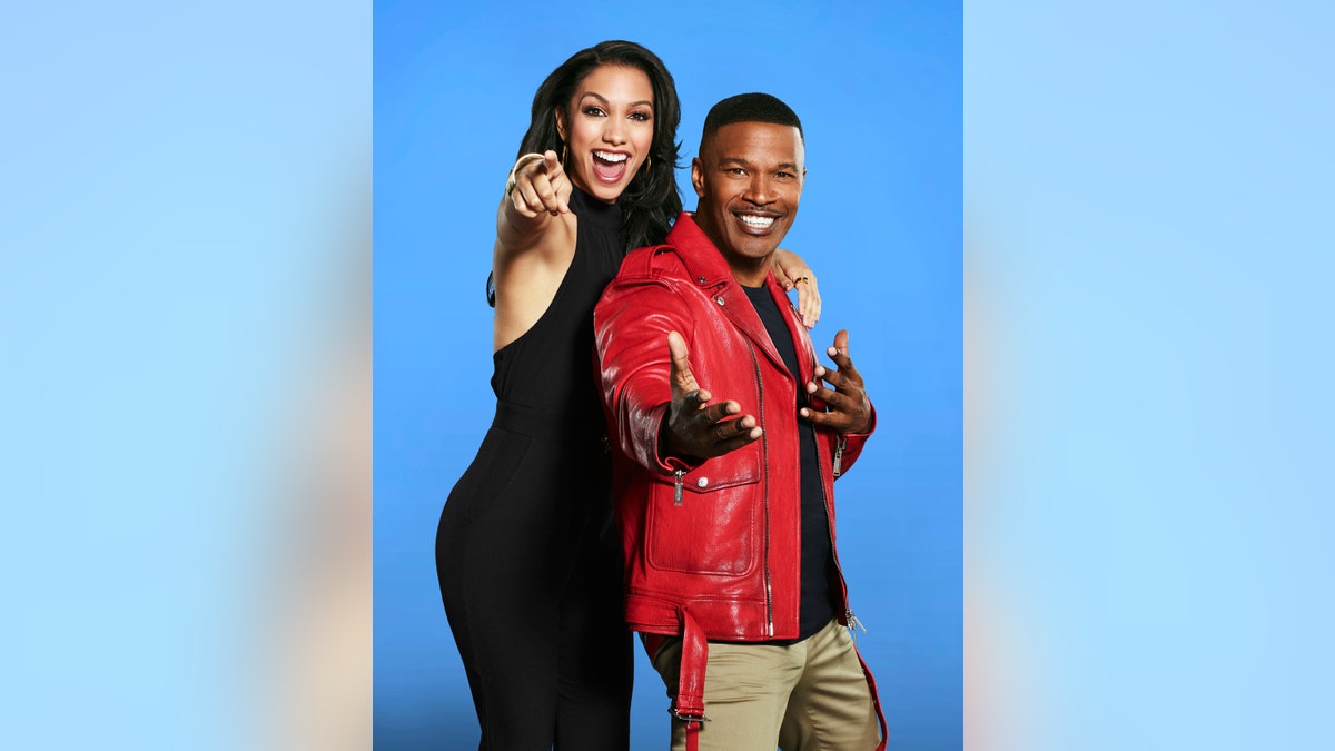 Jamie Foxx and Corinne pose together for a promotional photo