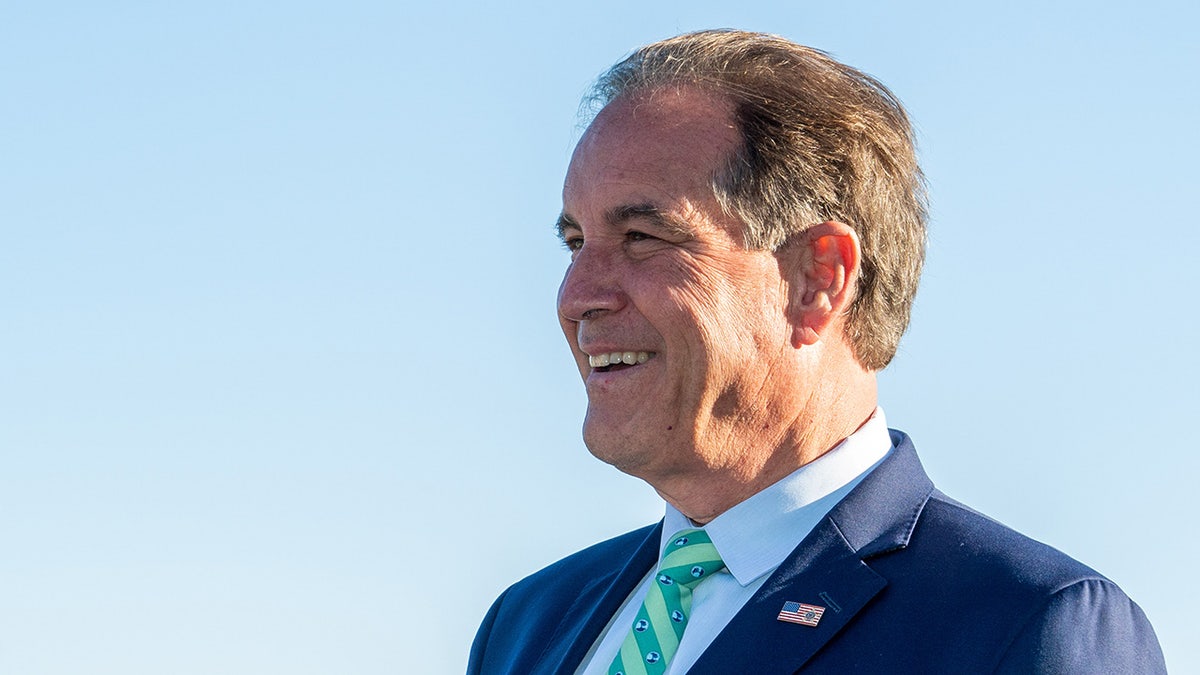 Jim Nantz during the final round of a golf tournament