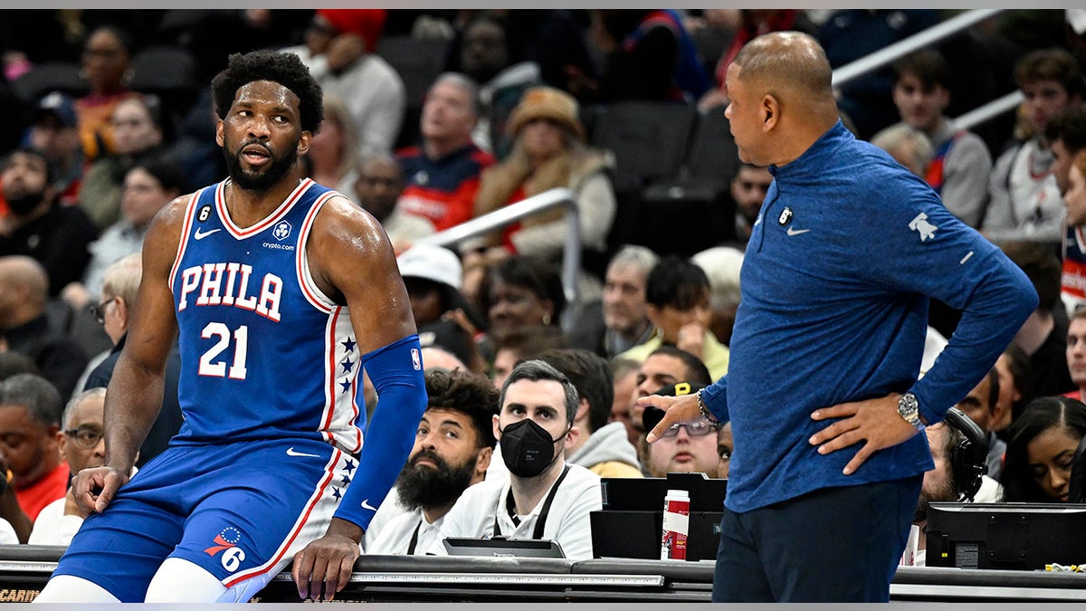 Joel Embiid talks to Doc Rivers