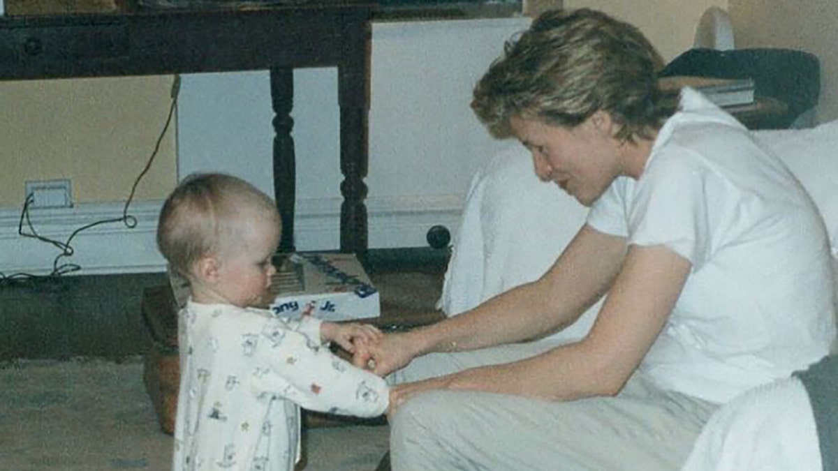 Kim Basinger with baby Ireland