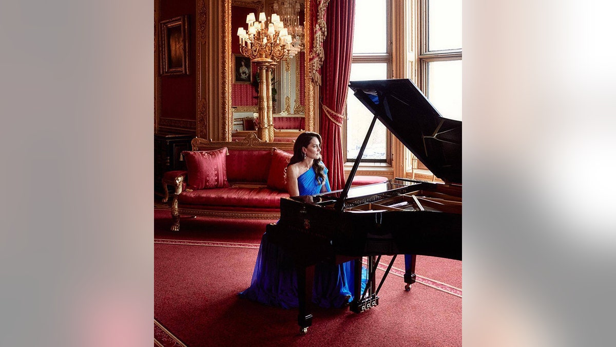 Kate Middleton plays the piano in a long Jenny Packham gown for Eurovision, filmed in the Crimson Drawing Room 