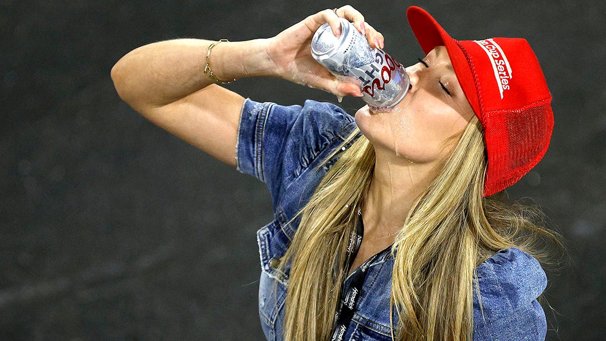 Katelyn Larson chugs a beer