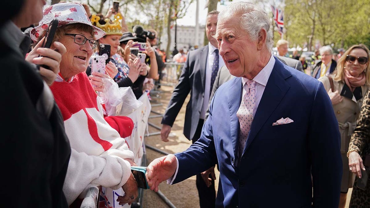 King Charles III on a walkabout outside Buckingham Palace, London