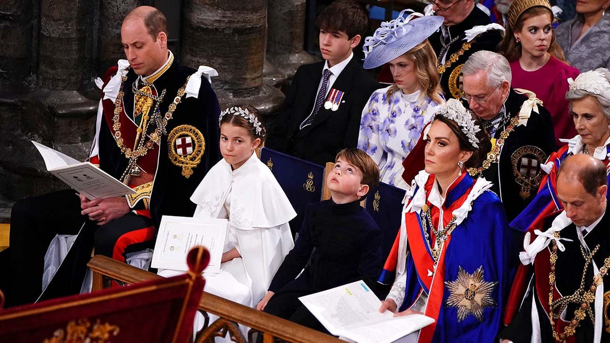 The Prince of Wales, Princess Charlotte, Prince Louis, the Princess of Wales and the Duke of Edinburgh at the coronation ceremony of King Charles III and Queen Camilla in Westminster Abbey, London