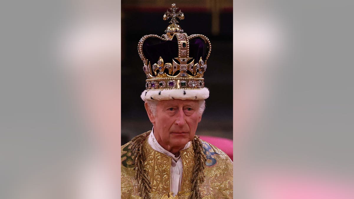 Britain's King Charles III with the St Edward's Crown on his head attends the Coronation Ceremony