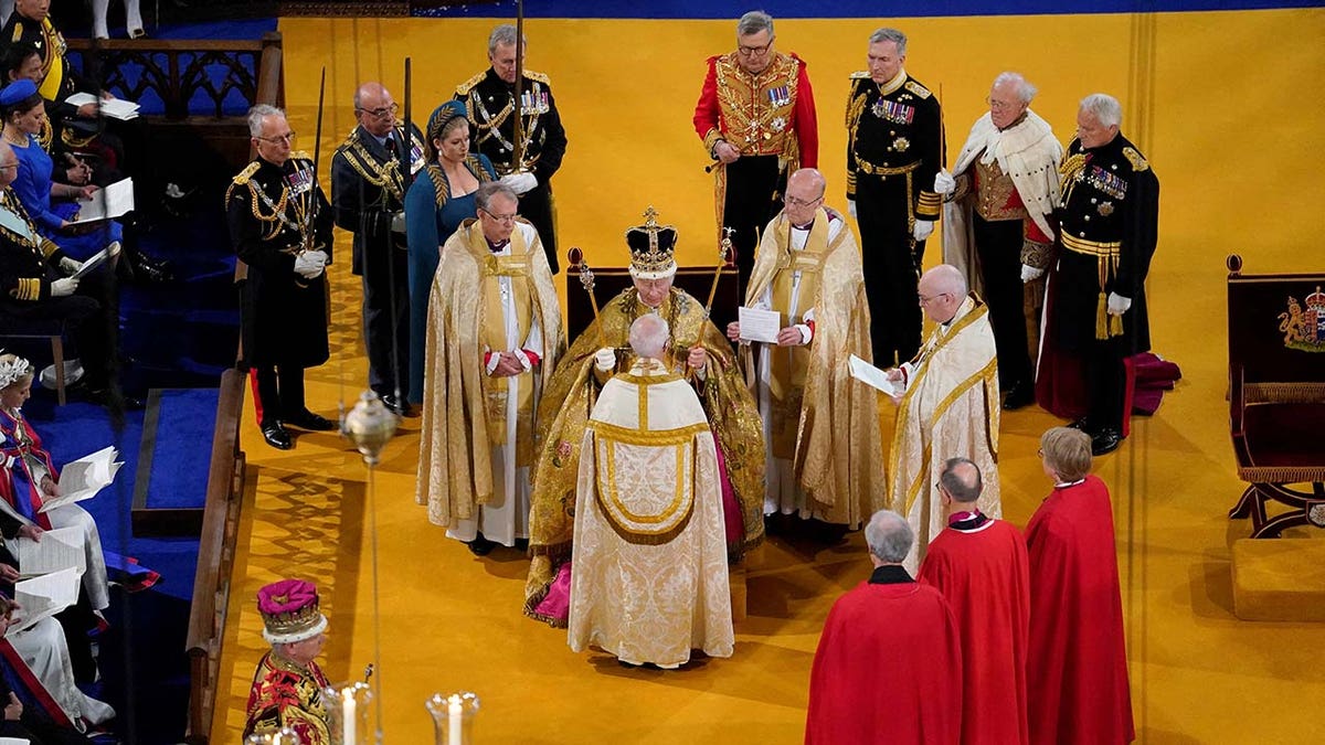 King Charles III receives The St Edward's Crown during his coronation ceremony in Westminster Abbey, London.