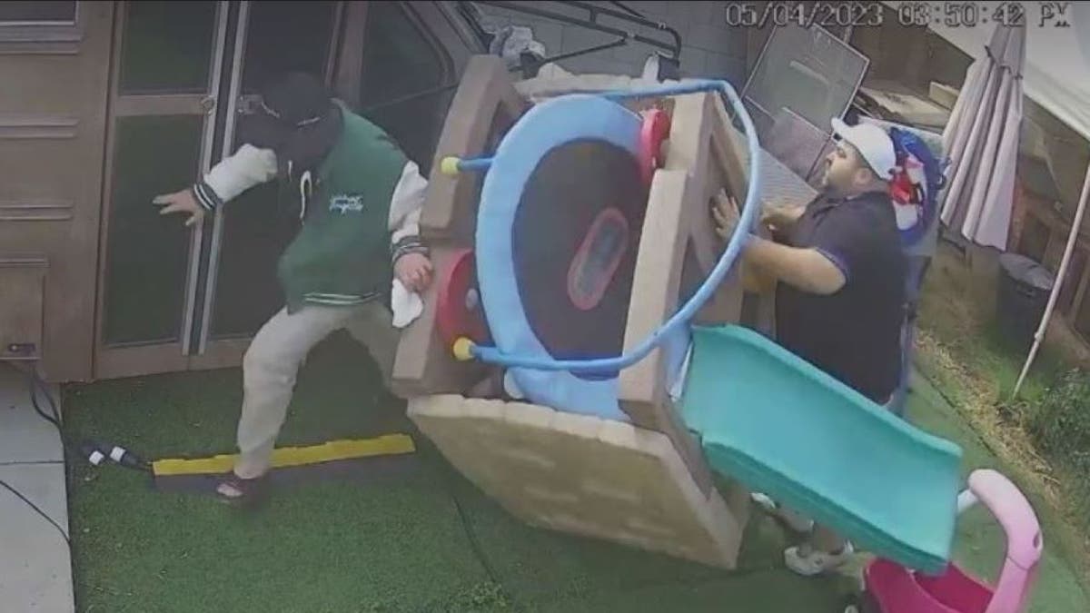 homeowner accosting burglar on security cam