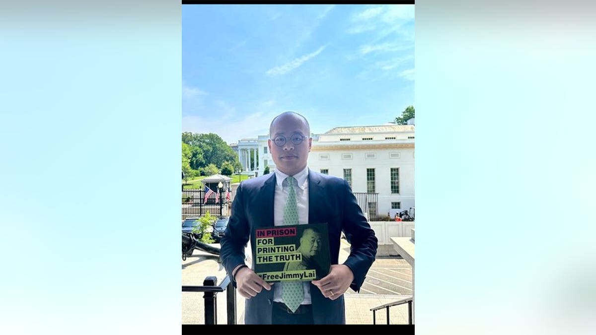 Lai posing for a photo at the White House.