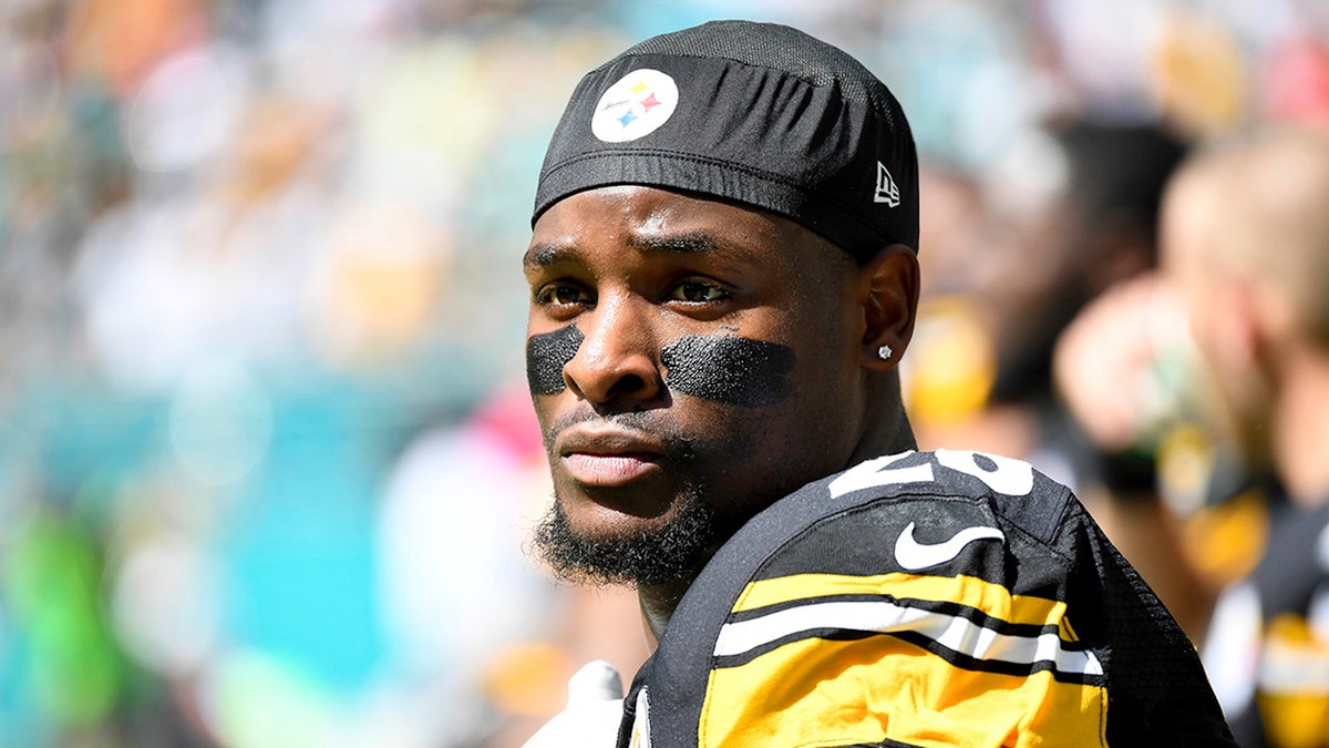 LeVeon Bell looks on before a game