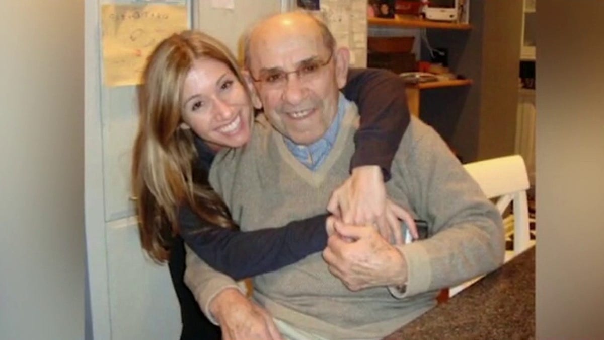 Lindsay Berra with her grandfather Yogi Berra.