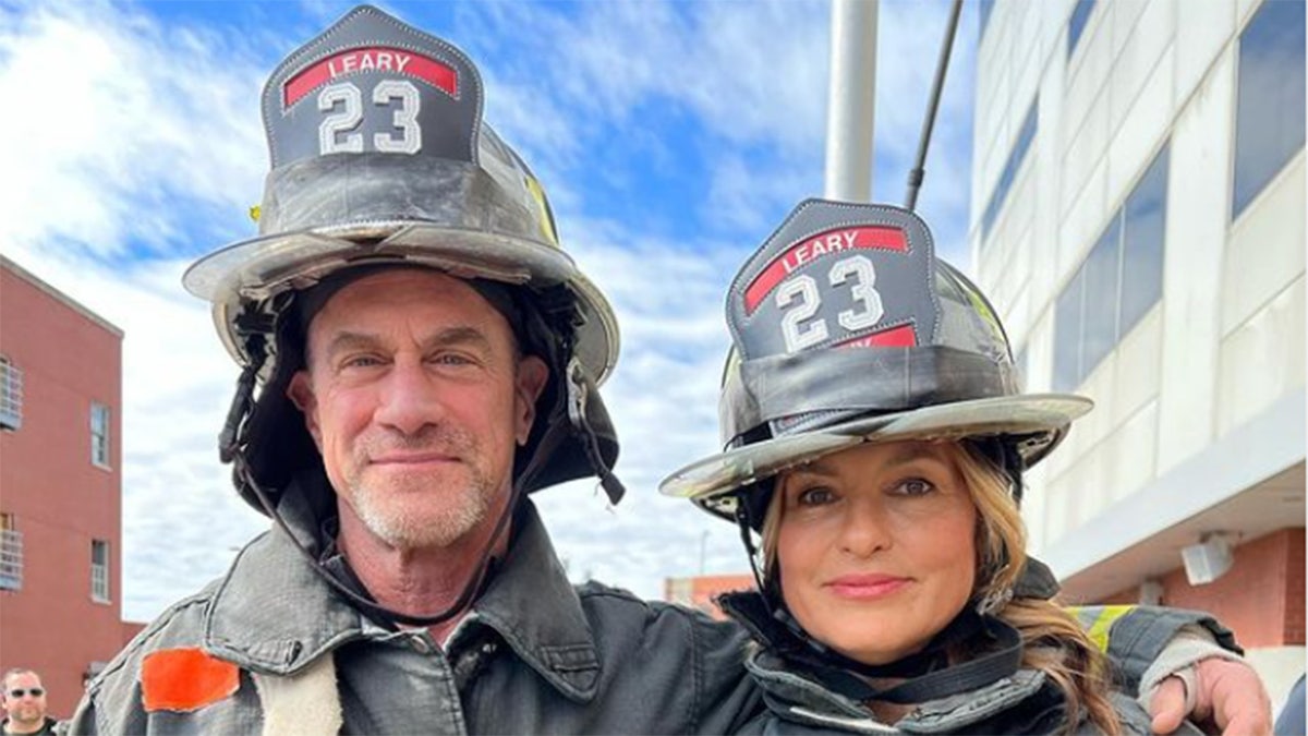 Mariska Hargitay and Christopher Meloni dressed in firefighter gear