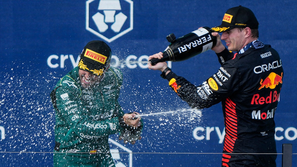 Max Verstappen sprays Fernando Alonso