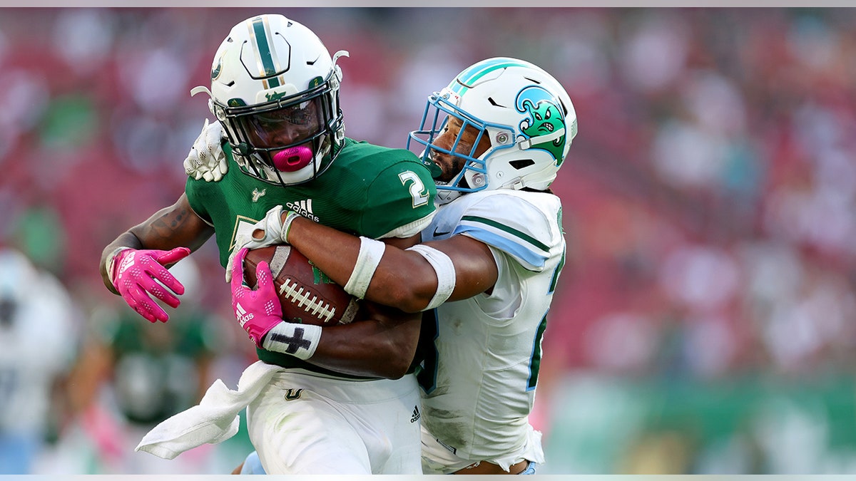 Michel Dukes tackled