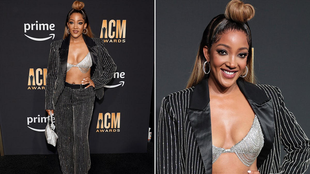 Mickey Guyton sports a rhinestone bikini top and black pinstripe suit at the ACM Awards