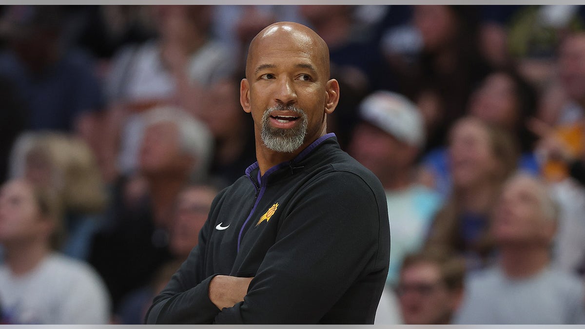 Monty Williams looks on court