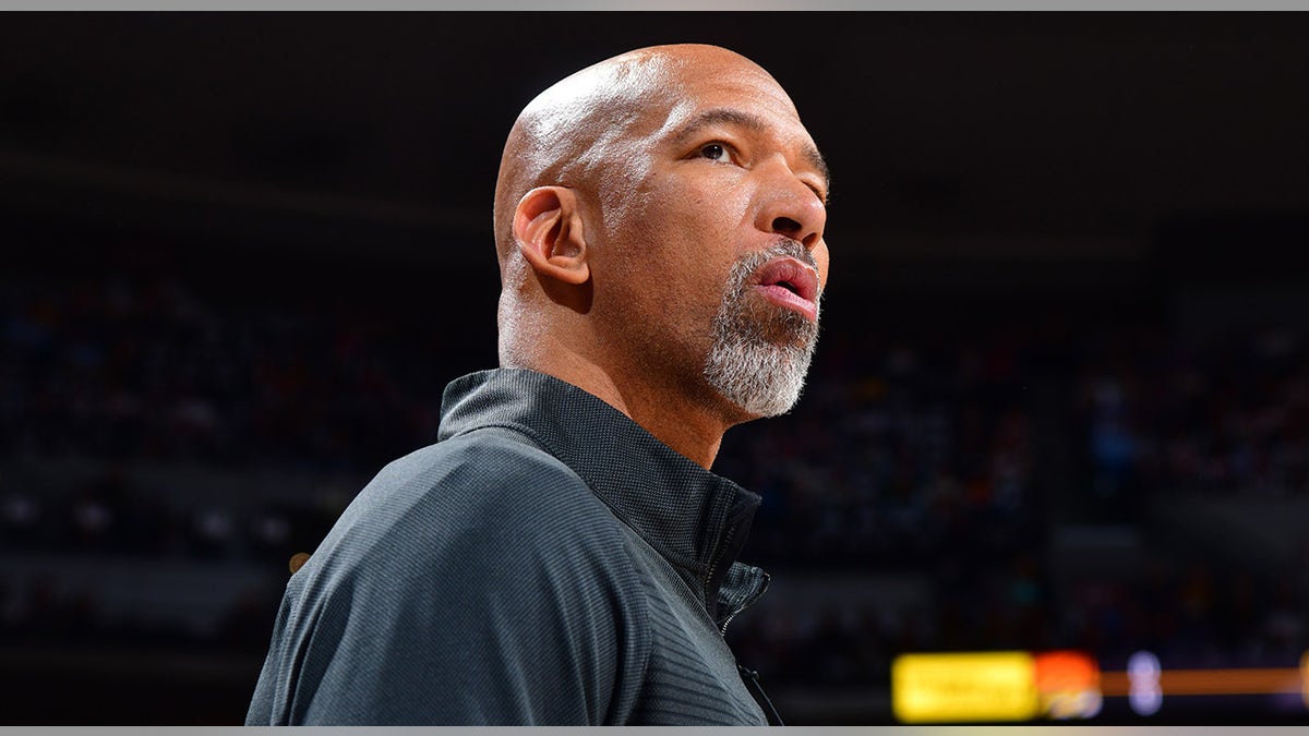 NBA coach Monty Williams looks up