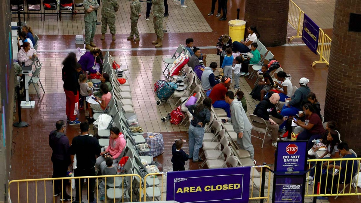 Recently arrived Migrants are pictured in the processing area at Port Authority Bus Terminal in Midtown Manhattan