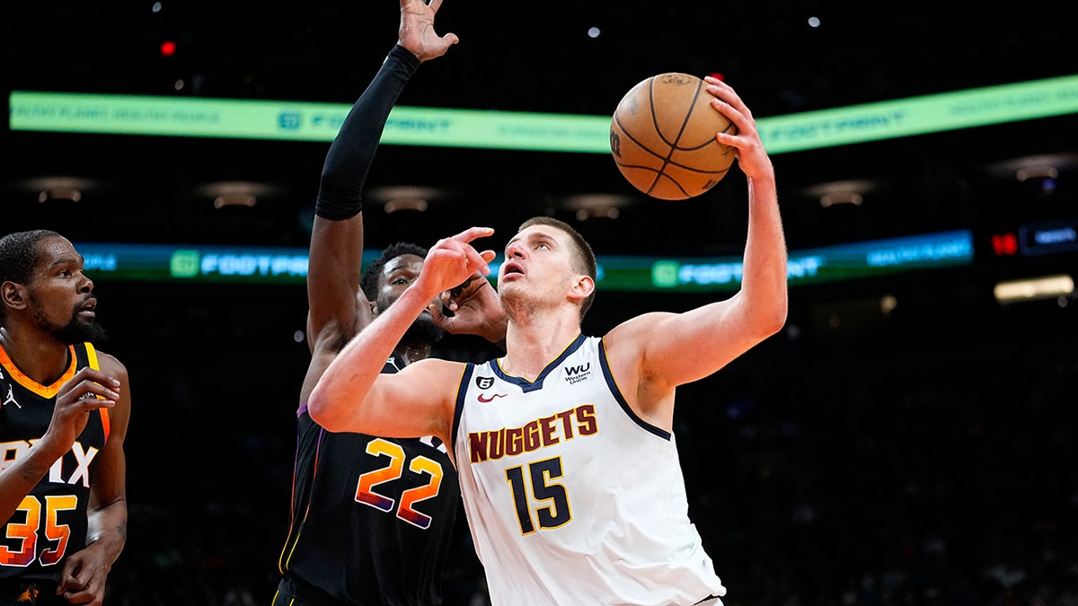 Nikola Jokic shoots